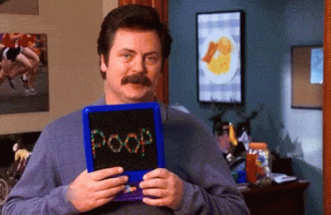 Ron Swanson Holding Twinkling Gotta Poop GIF