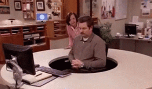 Ron Swanson Spinning In Front Of Computer GIF