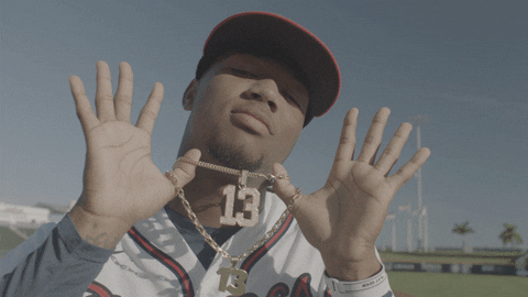 Ronald Acuna Jr Showing Off 13 Pendant GIF