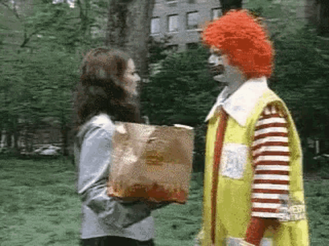 Ronald Mcdonald Clown Throws Woman's Mcdonalds Meal GIF