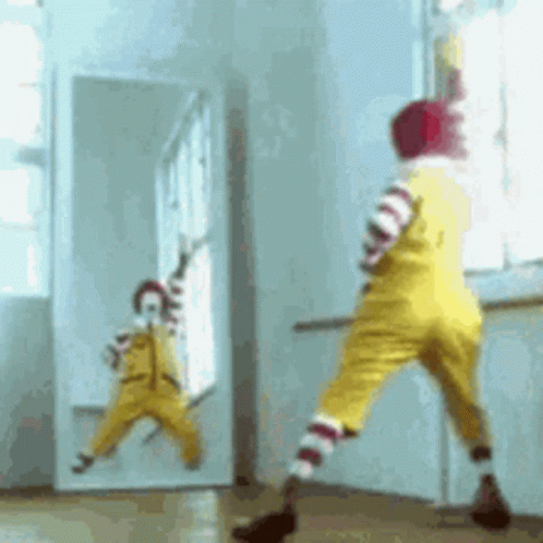 Ronald Mcdonalds Clown Posing At Mirror Funny GIF
