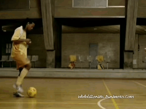 Ronaldinho Kicking The Ball While Eating GIF