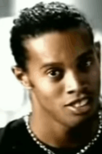 Ronaldinho Setting In The Chair While Playing GIF