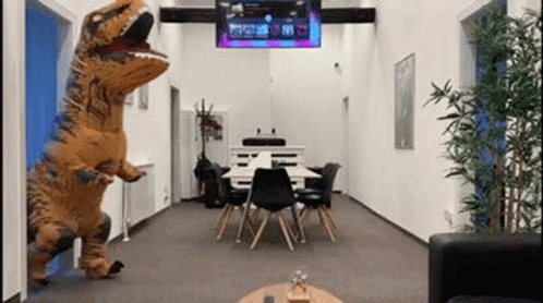 Room With T-Rex Costume Table And Chairs GIF