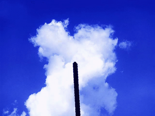 Rope Silhouetted Against Blue Sky and White Clouds