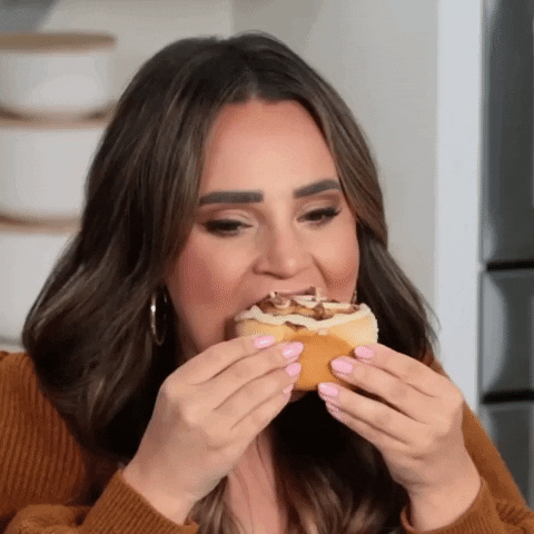 Rosanna Pansino Chewing Unexpected Reaction GIF
