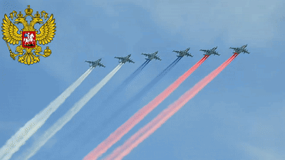 Row of Fighter Jets Flying With Russian Coat of Arms
