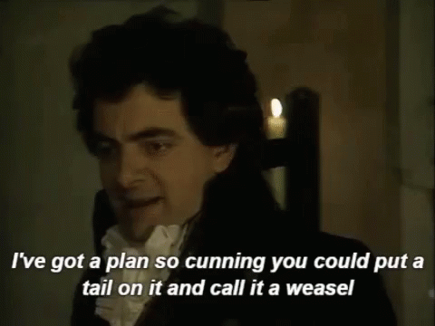 Rowan Atkinson Scheming GIF