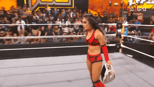 Roxanne Perez Showing Title To Lola Vice GIF