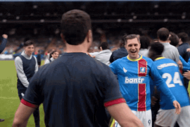 Roy Kent Ted Lasso Handshake Headbutt GIF