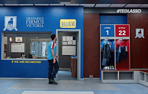 Roy Kent Touching Ted Lasso Believe Sign GIF