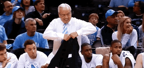 Roy Williams Waving His Coat GIF