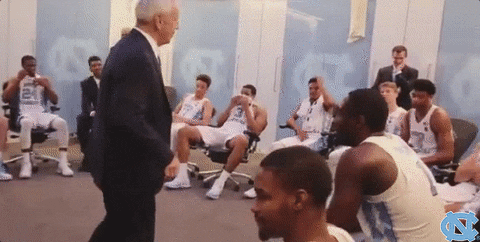 Roy Williams Exchanging High Five GIF