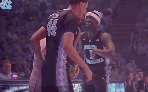 Roy Williams And His Team Sharing Joyful Moment GIF