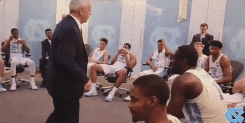 Roy Williams Exchanging High Five GIF