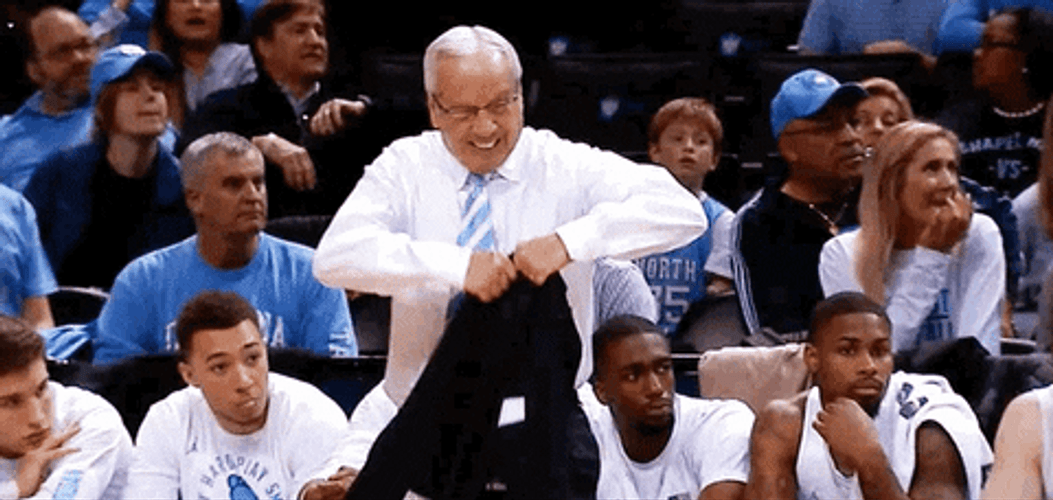 Roy Williams Waving His Coat GIF