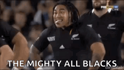 Rugby Player Making Funny Face in Black Shirt