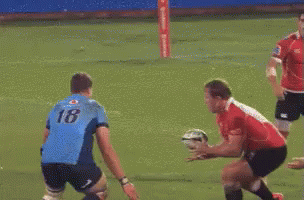 Rugby Player Number 23 Being Tackled GIF