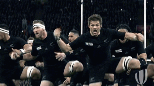 Rugby Players In Black Uniforms Saying All Black GIF