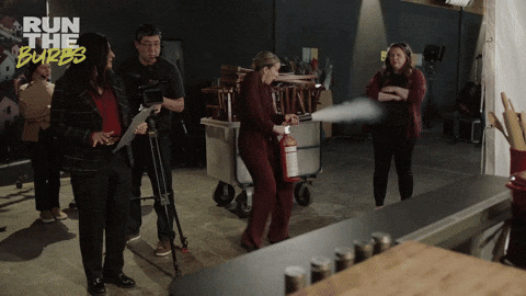 Run The Burbs Fire Extinguisher GIF