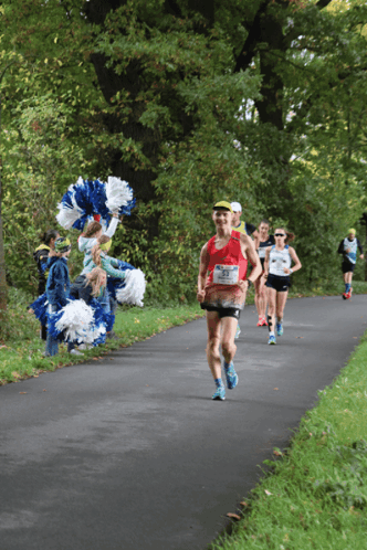 Runners Running Down Path