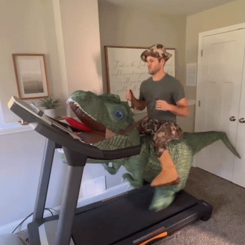 Running On Treadmill With A Dinosaur GIF