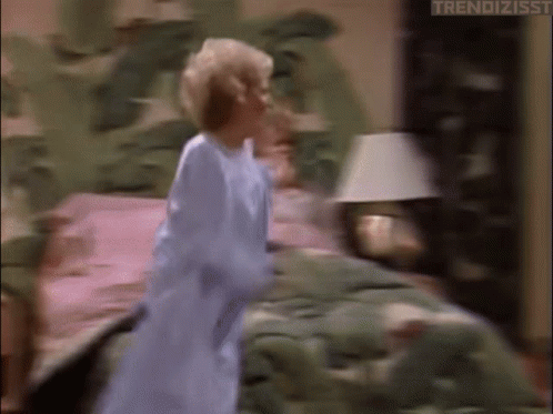 Running To The Door Hiding Meme GIF