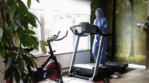 Running With A Hazmat Suit On Treadmill GIF