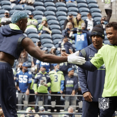 Russell Wilson Hand Shake GIF