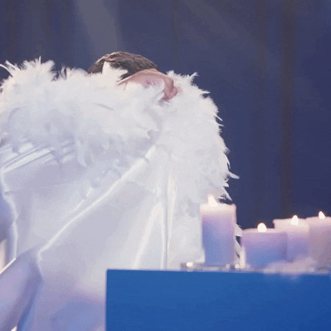 Russell Wilson In White Coat GIF