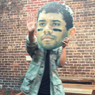 Russell Wilson Placard Face GIF