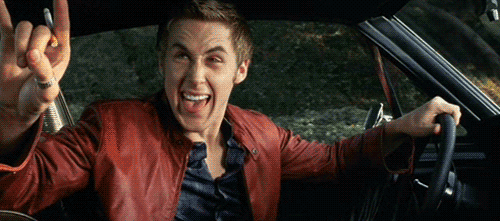 Ryan Gosling Giving You Rock Sign GIF