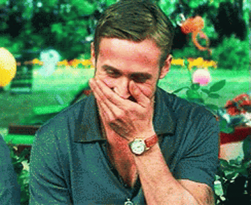 Ryan Gosling Cover Mouth Holding In Laugh GIF