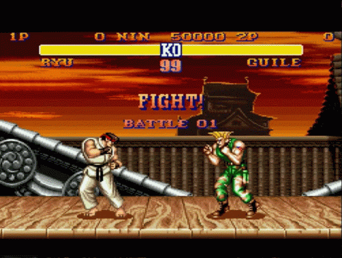Ryu And Guile Fight In A Video Game GIF