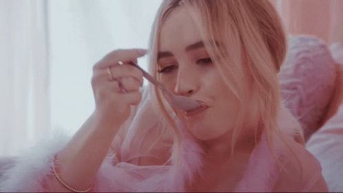 Sabrina Carpenter Holding A Spoon GIF