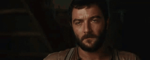 Sad Bearded Man In Suspenders GIF