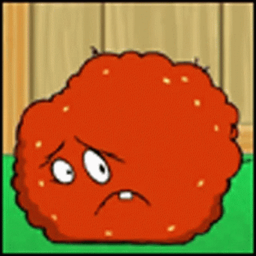 Sad Cartoon Chicken Nugget on Green Surface