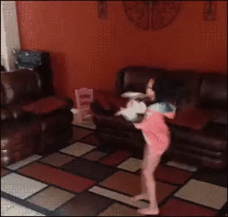 Sad Cat Playing Around A Little Girl GIF