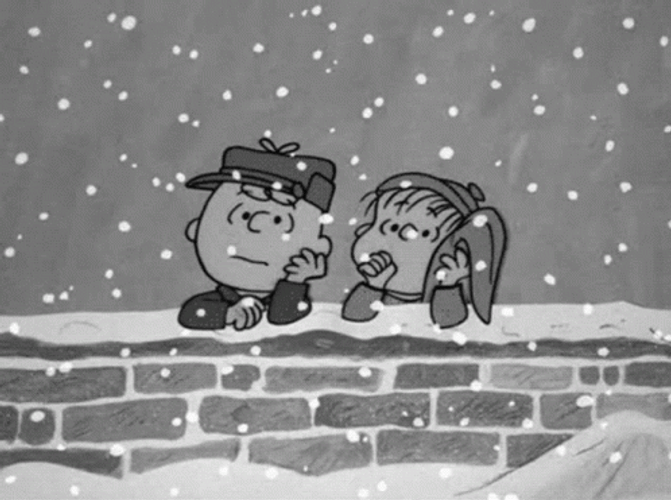 Sad Charlie Brown Watching Blizzard GIF