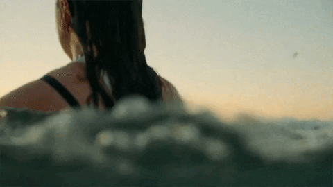 Sad Girl Feeling Emotions In Ocean Waves GIF