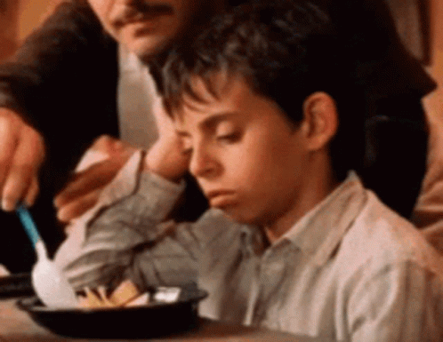 Sad Kid Staring At Nacho GIF