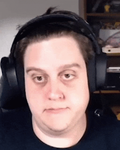 Sad Man Wearing Headphones Unamused GIF
