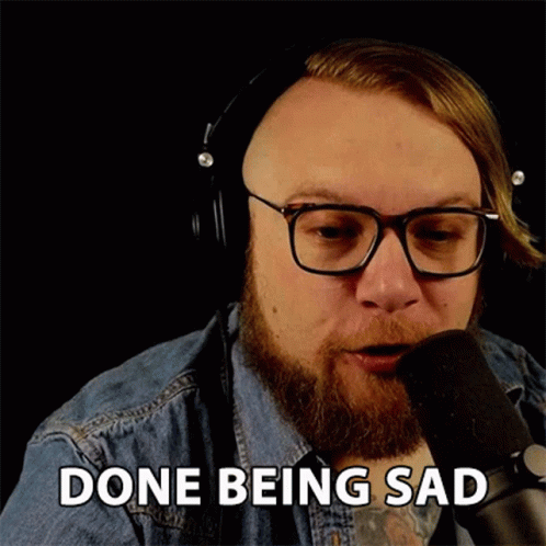 Sad Man With Headphones Talking Into Microphone GIF