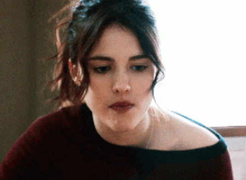 Sad Margaret Qualley Chewing Slowly GIF
