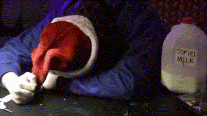 Sad Santa Banging Head On Desk GIF