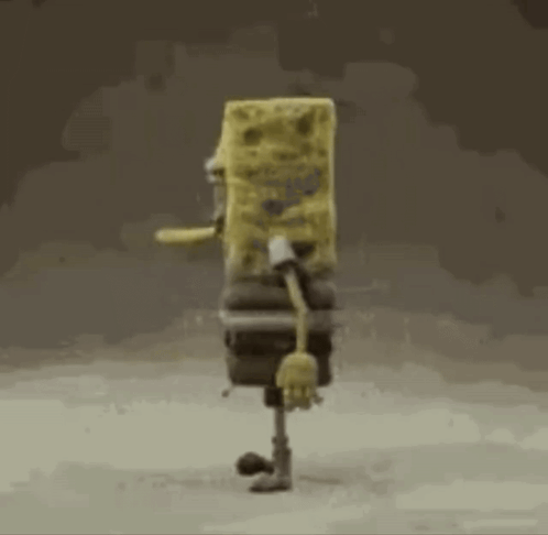 Sad SpongeBob SquarePants On Brown Surface GIF