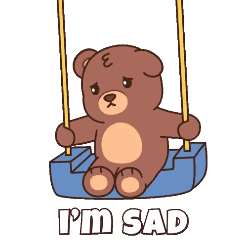 Sad Teddy Bear on Swing