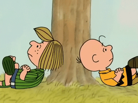 Sally And Charlie Brown Under The Tree GIF