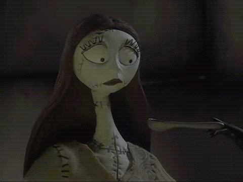 Sally From The Nightmare Before Christmas Has Stitches On Her Face And Neck GIF