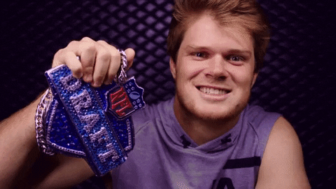 Sam Darnold Holding Draft Necklace GIF